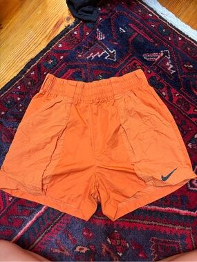 Nike Orange Elastic Waist Athletic Shorts with Swoosh Label